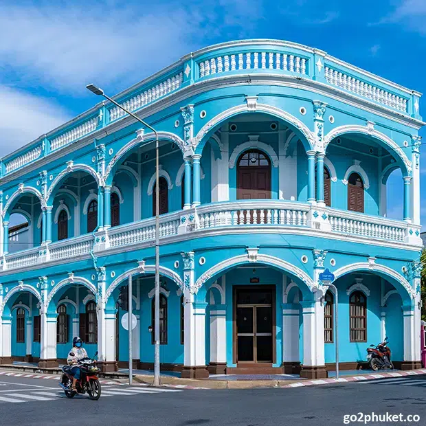 Colorful Sino-Portuguese buildings lining a historic street in Phuket Old Town, Phuket, Thailand.