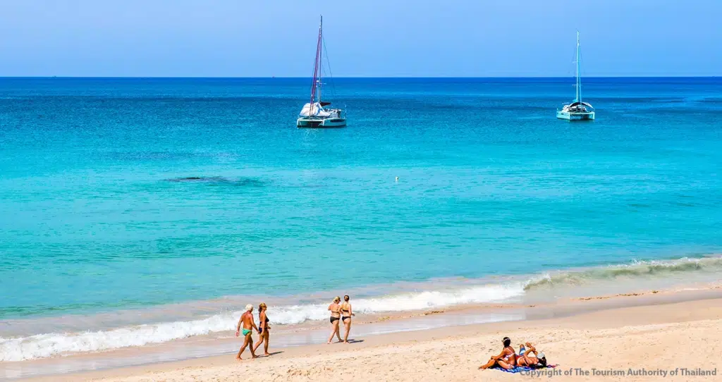 Golden sand and turquoise Andaman Sea waters at Surin Beach in Amphoe Thalang on Phuket Island, Thailand